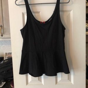 Black peplum top with red zipper